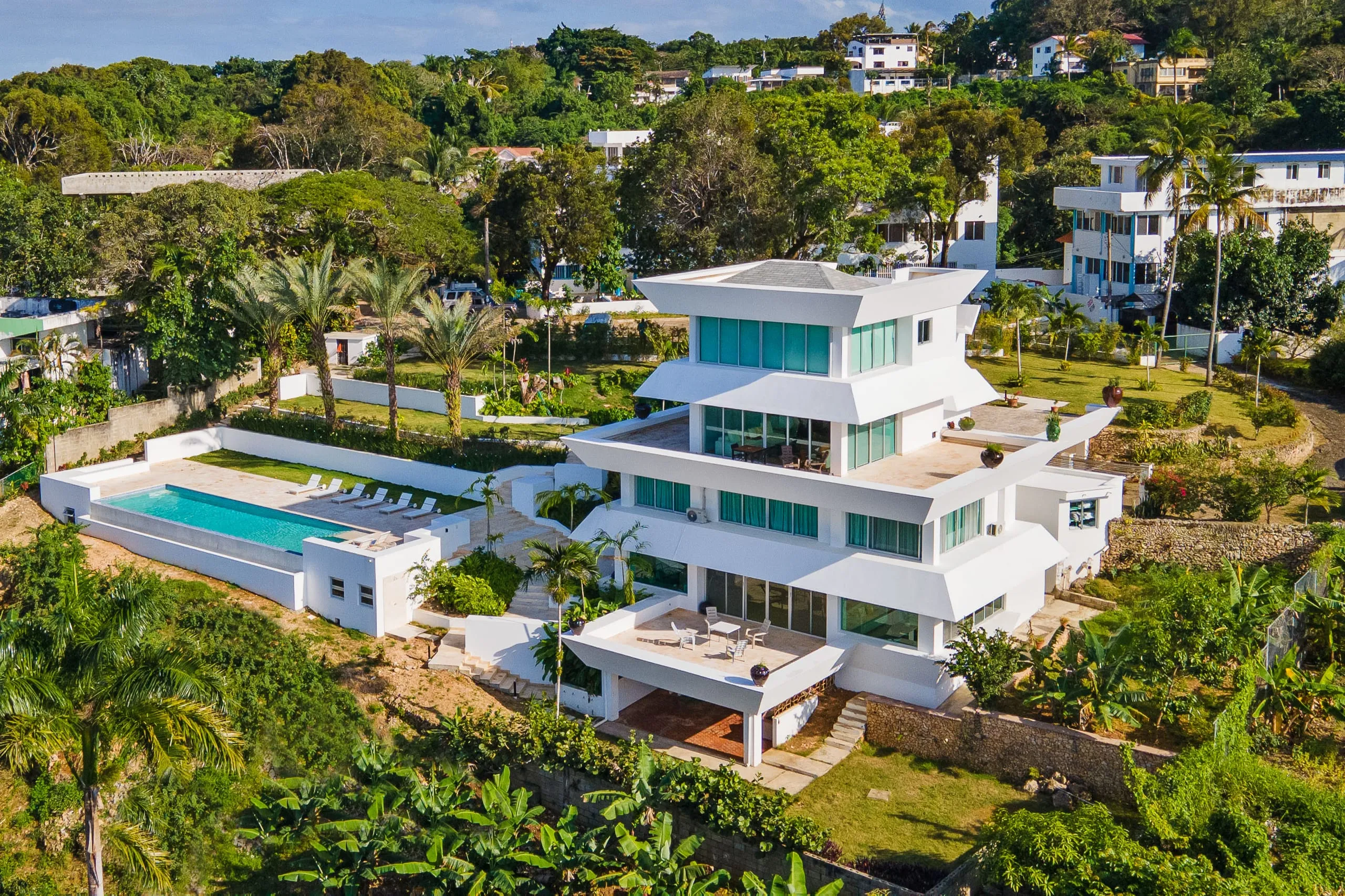 Aerial view of Villa Altamar on the hillside above the Sosúa coastline